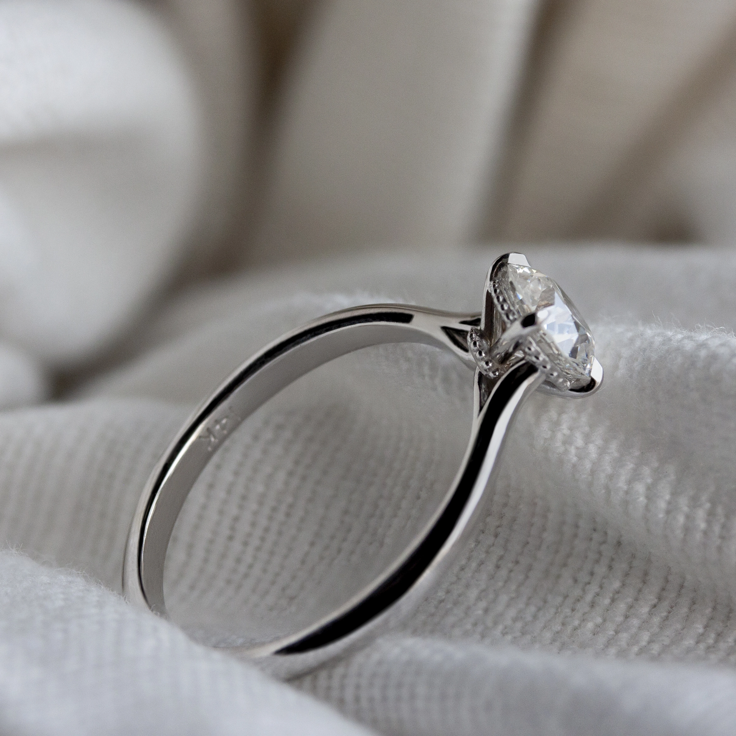 Gather Ring by Philadelphia's Emily Chelsea Jewelry, a custom solitaire inspired by floral elegance with a 2mm band.