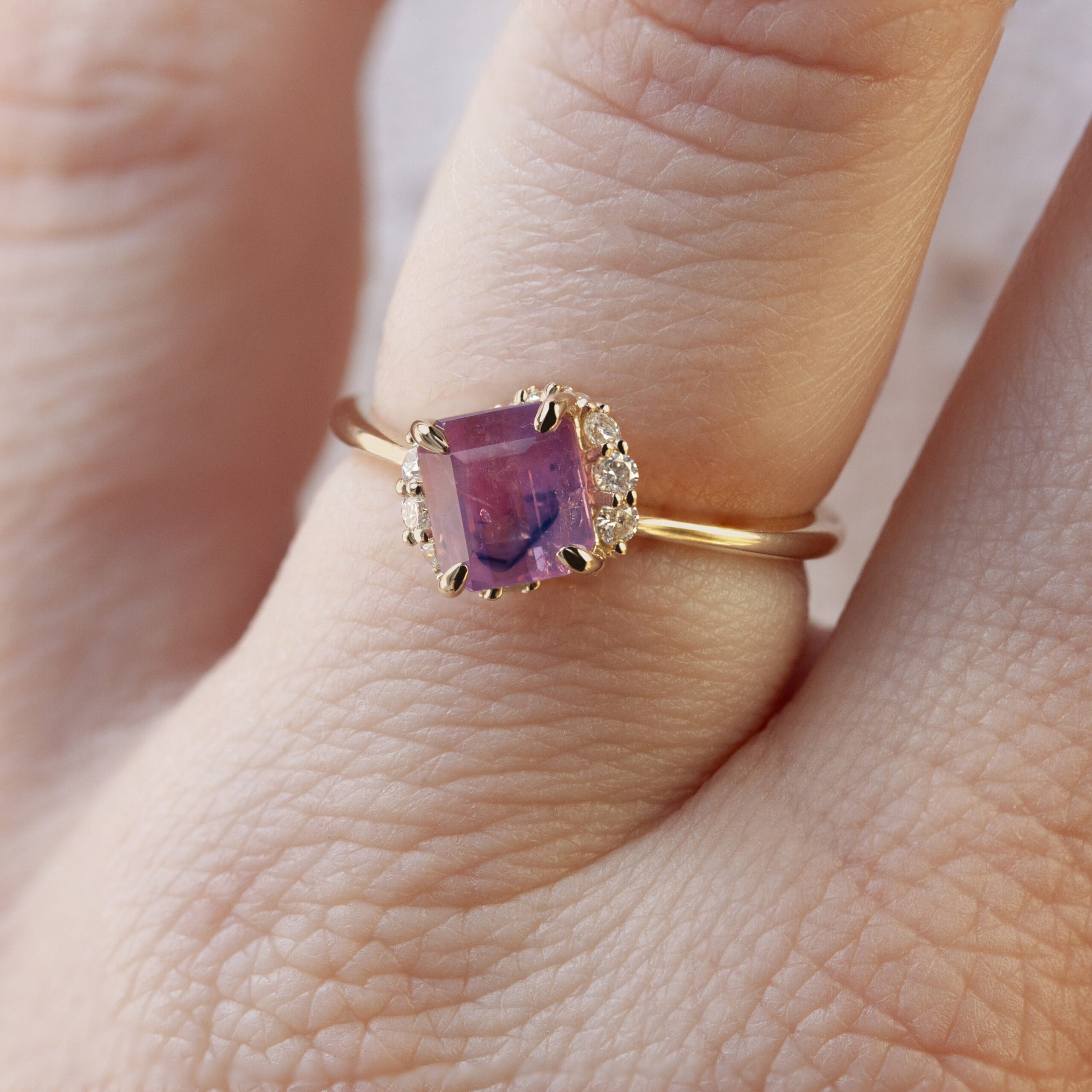 Spiral Staircase Ring by Philadelphia's Emily Chelsea Jewelry, showcasing swirling reclaimed diamonds, a dazzling center stone, and a 2mm band.